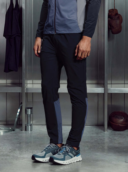 20251117_ARNE_ACTIVEWEAR_ROSS_COOKE_ACTIVECOLOURBLOCKWINDBREAKERINNAVY_ACTIVECOLOURBLOCKTRACKPANTINNAVY_064_faeadacf-76be-4f98-ab51-db9056d9ed84_600x600.jpg
