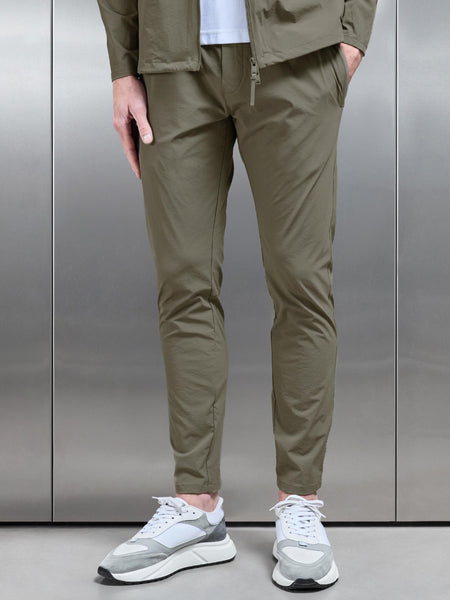ACTIVE_TECHNICAL_TAPERED_TRACKPANT_IN_OLIVE___12_965504ff-e824-4b99-a368-7e81bdc2a941_600x600.jpg