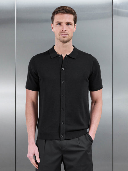 COTTONKNITTEDBUTTONTHROUGHSHORTSLEEVESHIRTINBLACK1_8697b539-8495-44c7-882e-a13135320168_600x600.jpg