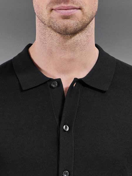 COTTONKNITTEDBUTTONTHROUGHSHORTSLEEVESHIRTINBLACK2_03aa7686-cd83-4642-99fe-545998d4504a_600x600.jpg