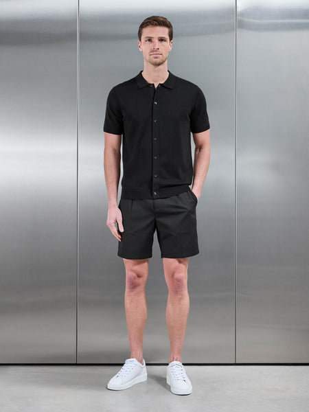 COTTONKNITTEDBUTTONTHROUGHSHORTSLEEVESHIRTINBLACK_328039cf-2a8c-47ef-adbf-883d10764d32_600x600.jpg