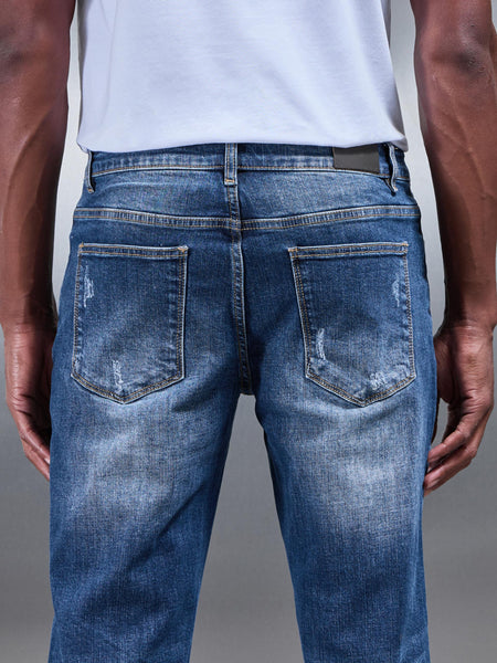 DISTRESSEDSTRAIGHTLEGDENIMJEANSINMIDBLUE4copy_600x600.jpg