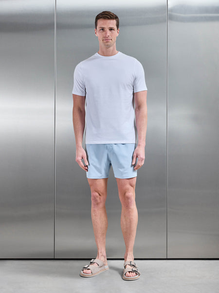ESSENTIALDRAWSTRINGSWIMSHORTINSOFTBLUE_e9f81afe-42c6-4ed5-bbf9-352bf8e4dcc3_600x600.jpg