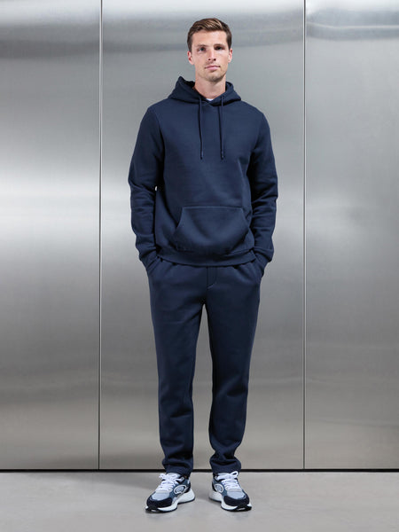 ESSENTIALHOODIEINNAVY-14908690203010_600x600.jpg