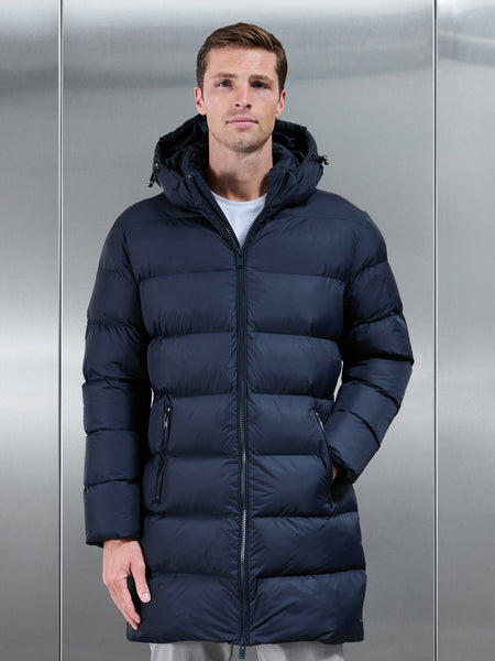 ESSENTIALMIDLENGTHPUFFERJACKETINNAVY2_7cd3b9f3-9c3a-4858-a298-ee05ffa8701e_600x600.jpg