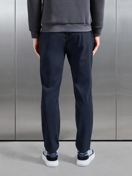 ESSENTIALNYLONTROUSERINNAVY2_CC_600x600.jpg