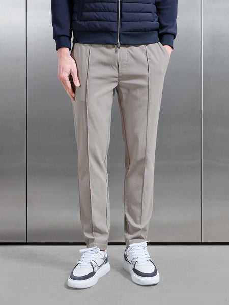ESSENTIALNYLONTROUSERINSTONE1_CC_600x600.jpg