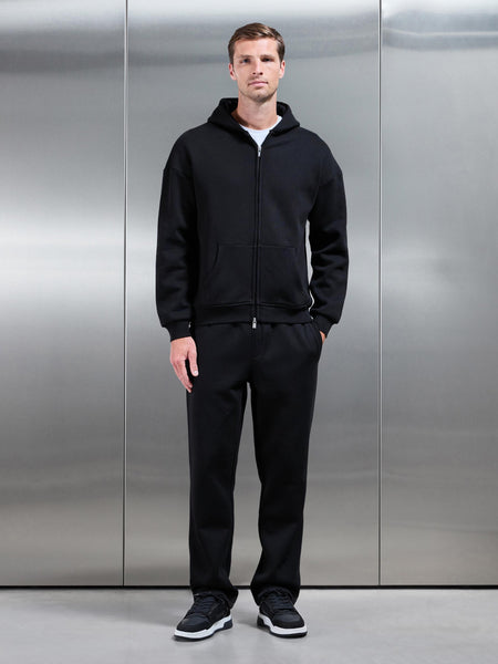 ESSENTIALRELAXEDFITZIPTHROUGHHOODIEINBLACK1_600x600.jpg
