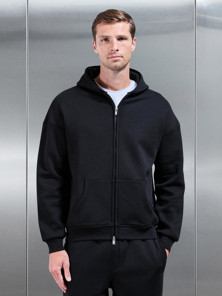 ESSENTIALRELAXEDFITZIPTHROUGHHOODIEINBLACK7_600x600.jpg