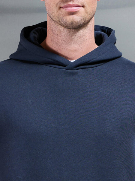 ESSENTIALRELAXEDHOODIEINNAVY-149614422920985_600x600.jpg
