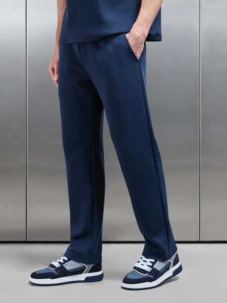 ESSENTIAL_LUXE_STRAIGHT_LEG_JOGGER_IN_NAVY_9_f4fdd4ba-274f-475e-afc3-33193f9bb746_600x600.jpg