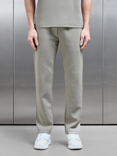 ESSENTIAL_LUXE_STRAIGHT_LEG_JOGGER_IN_STONE_3_99e7cd36-9043-4ec8-8a6c-a73125976b45_600x600.jpg
