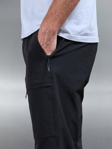 FRONTPOCKETTECHNICALCARGOPANTINBLACK2_6510fc6f-dd56-4930-8996-1423134cc226_600x600.jpg