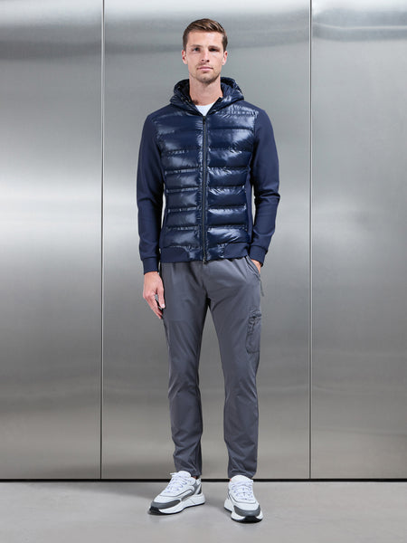 HYBRIDPUFFERJACKETINNAVY-149616215658267_5d4ecba5-2bfc-4e1e-ae5c-ba0ede38b447_600x600.jpg