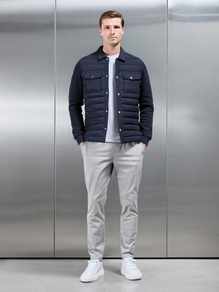HYBRIDQUILTEDOVERSHIRTINNAVYcopy_d23a988a-4ee5-4803-9d43-f65f2b3fb270_600x600.jpg