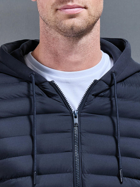HYBRIDQUILTEDTECHNICALWINDBREAKERINNAVY3_e533b42a-55e4-41c1-9394-ff9136554140_600x600.jpg