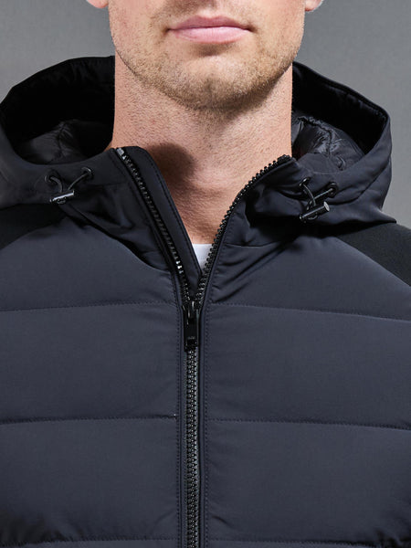 HYBRIDTECHNICALPUFFERWINDBREAKERINBLACK3_600x600.jpg