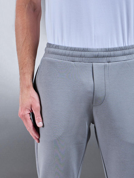 INTERLOCKJERSEYESSENTIALJOGGERINGREY-75394925855714_9cc3587a-861e-44f9-aad8-2caf24eeea61_600x600.jpg