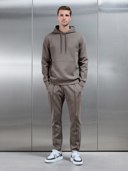 INTERLOCKJERSEYHOODIEINTAUPE-7538224627811_f859daf7-2882-487c-97e9-ebfac1111fb9_600x600.jpg