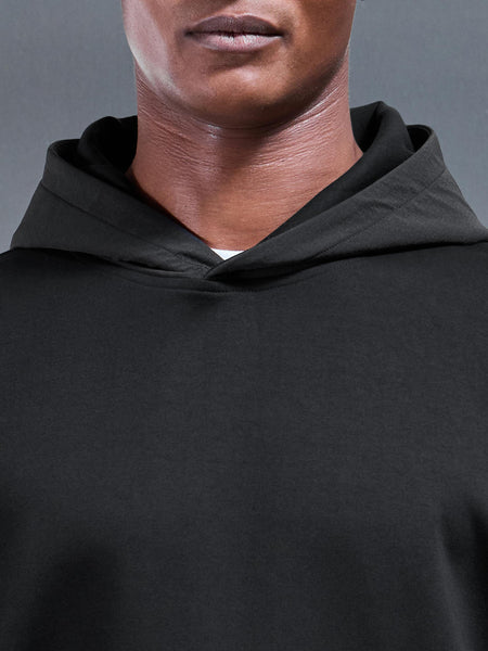 INTERLOCKJERSEYHYBRIDRELAXEDHOODIEINBLACK1_600x600.jpg