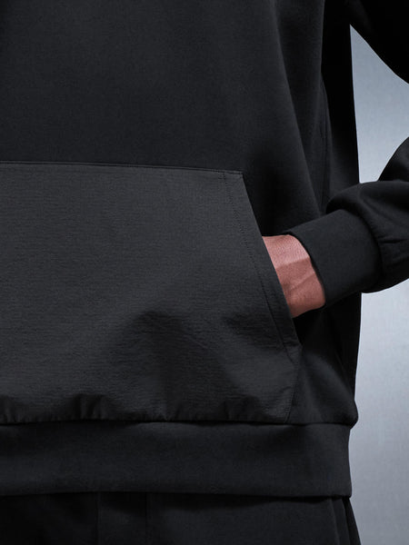 INTERLOCKJERSEYHYBRIDRELAXEDHOODIEINBLACK2_600x600.jpg