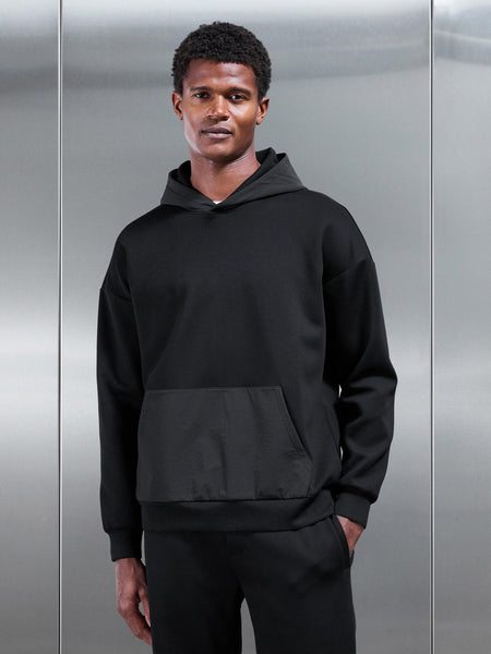 INTERLOCKJERSEYHYBRIDRELAXEDHOODIEINBLACK3_600x600.jpg