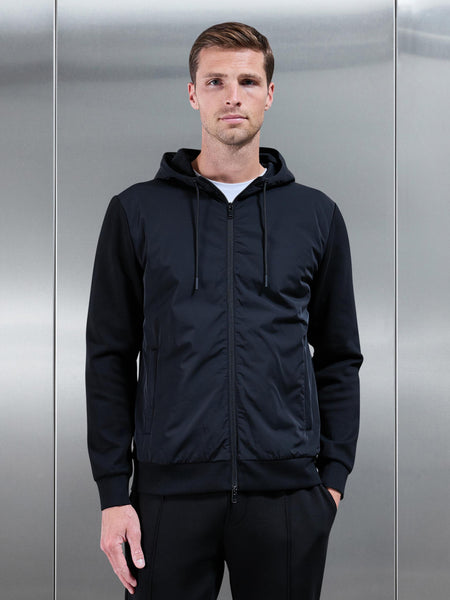 INTERLOCKJERSEYHYBRIDTECHNICALWINDBREAKERINBLACK3_35c0b394-0b87-426e-b5d5-c90c17bb297e_600x600.jpg
