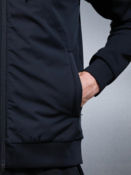 INTERLOCKJERSEYHYBRIDTECHNICALWINDBREAKERINBLACK4_96286f36-0c75-4403-b75d-1c4cb883b914_600x600.jpg
