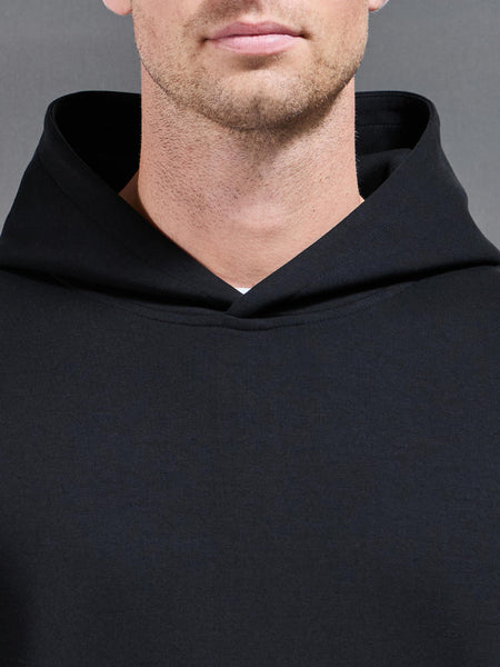 INTERLOCKJERSEYRELAXEDFITHOODIEINBLACK2_600x600.jpg