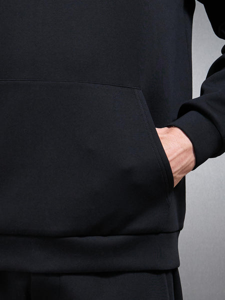 INTERLOCKJERSEYRELAXEDFITHOODIEINBLACK3_600x600.jpg