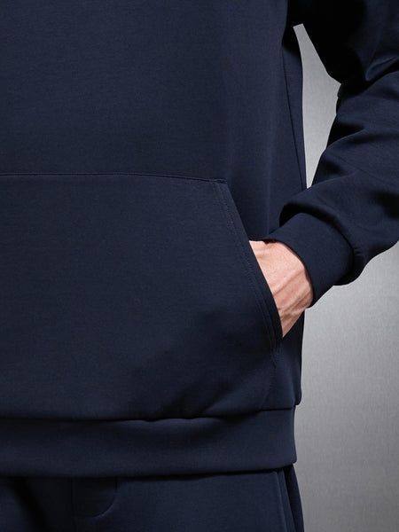INTERLOCKJERSEYRELAXEDFITHOODIEINNAVY3_600x600.jpg