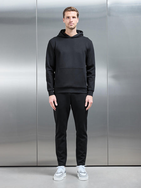 INTERLOCK_JERSEY_ESSENTIAL_HOODIE_IN_BLACK___2full_1b47d032-c6ed-4223-bdbf-81c456205a33_600x600.jpg
