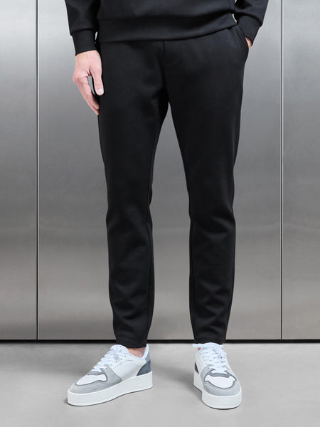 INTERLOCK_JERSEY_ESSENTIAL_JOGGER_IN_BLACK___3_42ca2829-25f1-40e5-acd9-41043aeab516_600x600.jpg