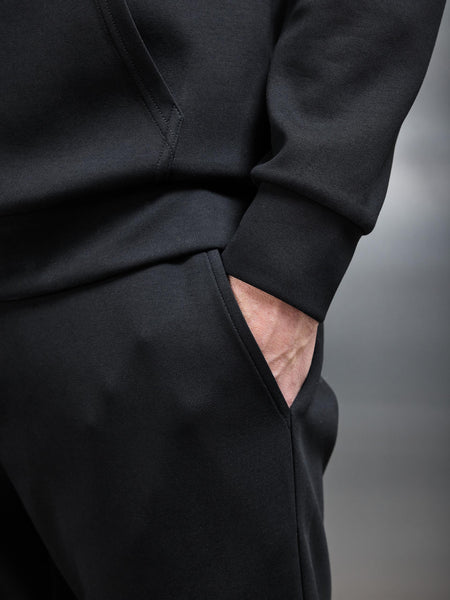 INTERLOCK_JERSEY_ESSENTIAL_JOGGER_IN_BLACK___4_58a6e8f7-eab1-4168-b074-154a65527e42_600x600.jpg