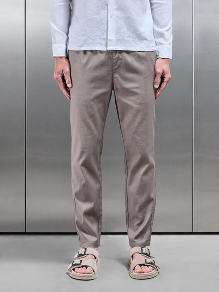 LINENDRAWSTRINGTROUSERINTAUPE1_d22069bf-589e-4c03-ac03-0e746d4e4915_600x600.jpg