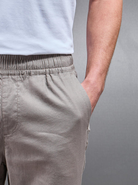 LINENDRAWSTRINGTROUSERINTAUPE4_ab788714-24ba-4436-b26a-3bc765ba27c1_600x600.jpg
