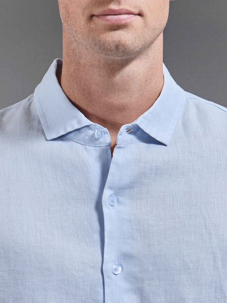 LINENSHORTSLEEVECUTAWAYCOLLARSHIRTINLIGHTBLUE2_8ca9d3fc-6393-49a0-839c-cdab4c0094e3_600x600.jpg