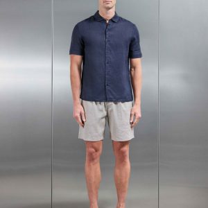 LINENSHORTSLEEVECUTAWAYCOLLARSHIRTINNAVY_b876c25e-1b88-443a-ba23-06e491ed1032_600x600.jpg