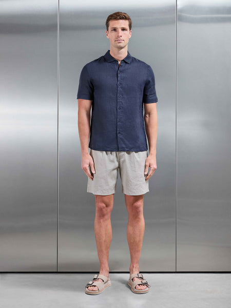 LINENSHORTSLEEVECUTAWAYCOLLARSHIRTINNAVY_b876c25e-1b88-443a-ba23-06e491ed1032_600x600.jpg