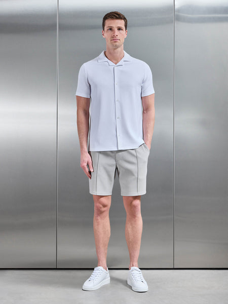PLEATEDREVERECOLLARSHIRTINWHITE_ddbdbb27-7649-452b-bc15-50af04016d94_600x600.jpg