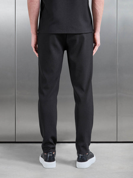 PLEATEDTROUSERINBLACK2_141e4877-66e3-429e-91c6-2764d1fc4c5e_600x600.jpg