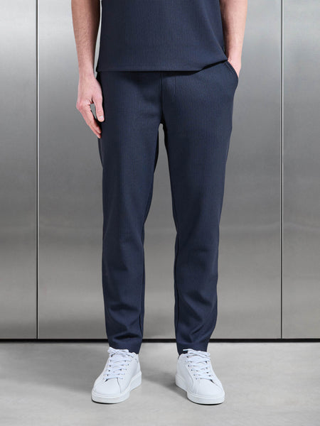 PLEATEDTROUSERINNAVY1_1e4f96ec-3cab-4ab7-a824-931f00fde7c5_600x600.jpg