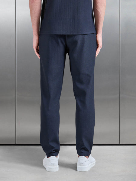 PLEATEDTROUSERINNAVY2_4bc43b22-2aee-4804-991b-92fe76deff54_600x600.jpg