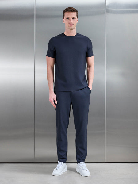 PLEATEDTROUSERINNAVY_e28b8a74-306d-4730-8186-272f6af14287_600x600.jpg