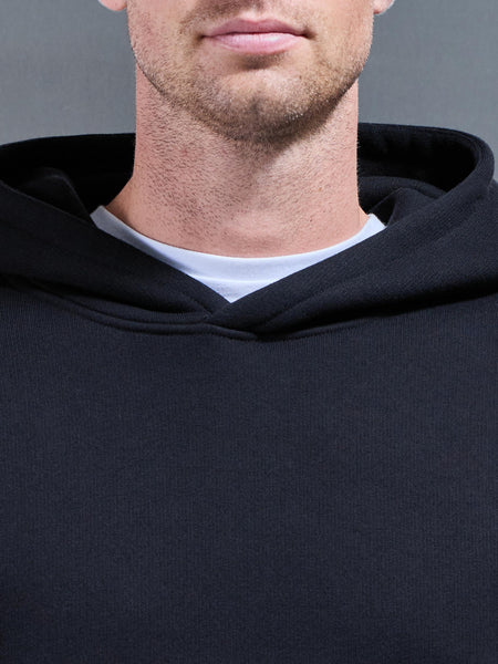 RELAXEDFITHOODIEINBLACK1_6f76ffda-c421-411f-a17c-d61e870b551e_600x600.jpg