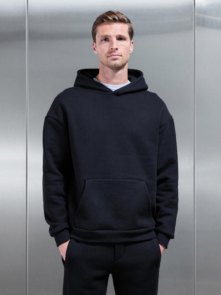 RELAXEDFITHOODIEINBLACK_dcb7b30a-1de3-4e0e-bba2-7d234e0dcb16_600x600.jpg
