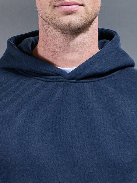 RELAXEDFITHOODIEINNAVY2_600x600.jpg
