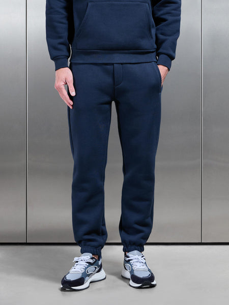 RELAXEDFITJOGGERINNAVY1_b16dff68-ea08-4362-baa9-459a65cee956_600x600.jpg