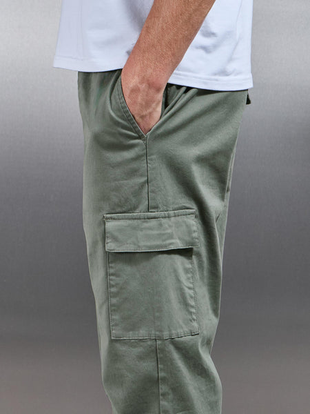 RELAXED_FIT_COTTON_CARGO_PANT_IN_OLIVE_2_copy_120a28a3-3fad-46f8-a406-2476c65d0f50_600x600.jpg