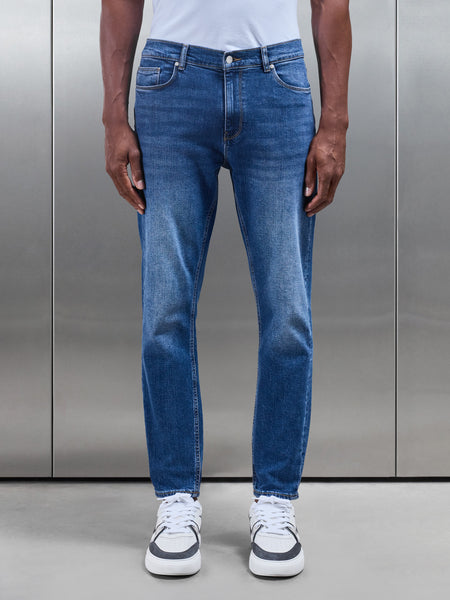 SLIMFITDENIMJEANSINMIDBLUE_7_46e49161-be7e-4778-b5d0-da249d4a65a7_600x600.jpg